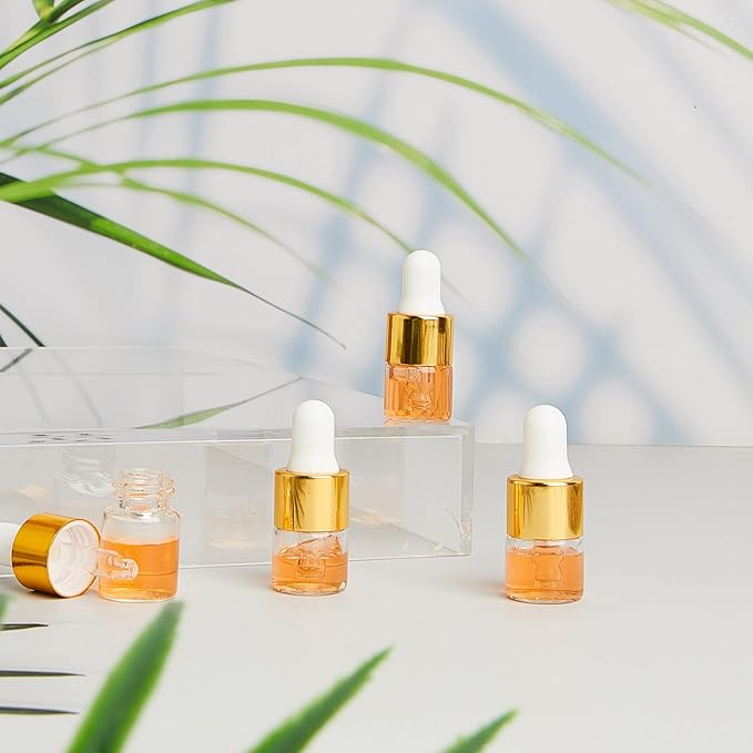 12 Pcs Mini Glass Oil Dropper Bottle Bulk, Clear Essential Small Empty Bottles Sample Containers Perfume Liquid Vials with Cap for Traveling (1 ml,Gold)
