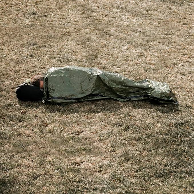 Survival Frog Tact Bivvy 2.0 Emergency Sleeping Bag w/Stuff Sack, Carabiner, Survival Whistle, ParaTinder - Compact, Lightweight, Waterproof, Reusable, Thermal Bivy Sack Cover, Shelter Kit